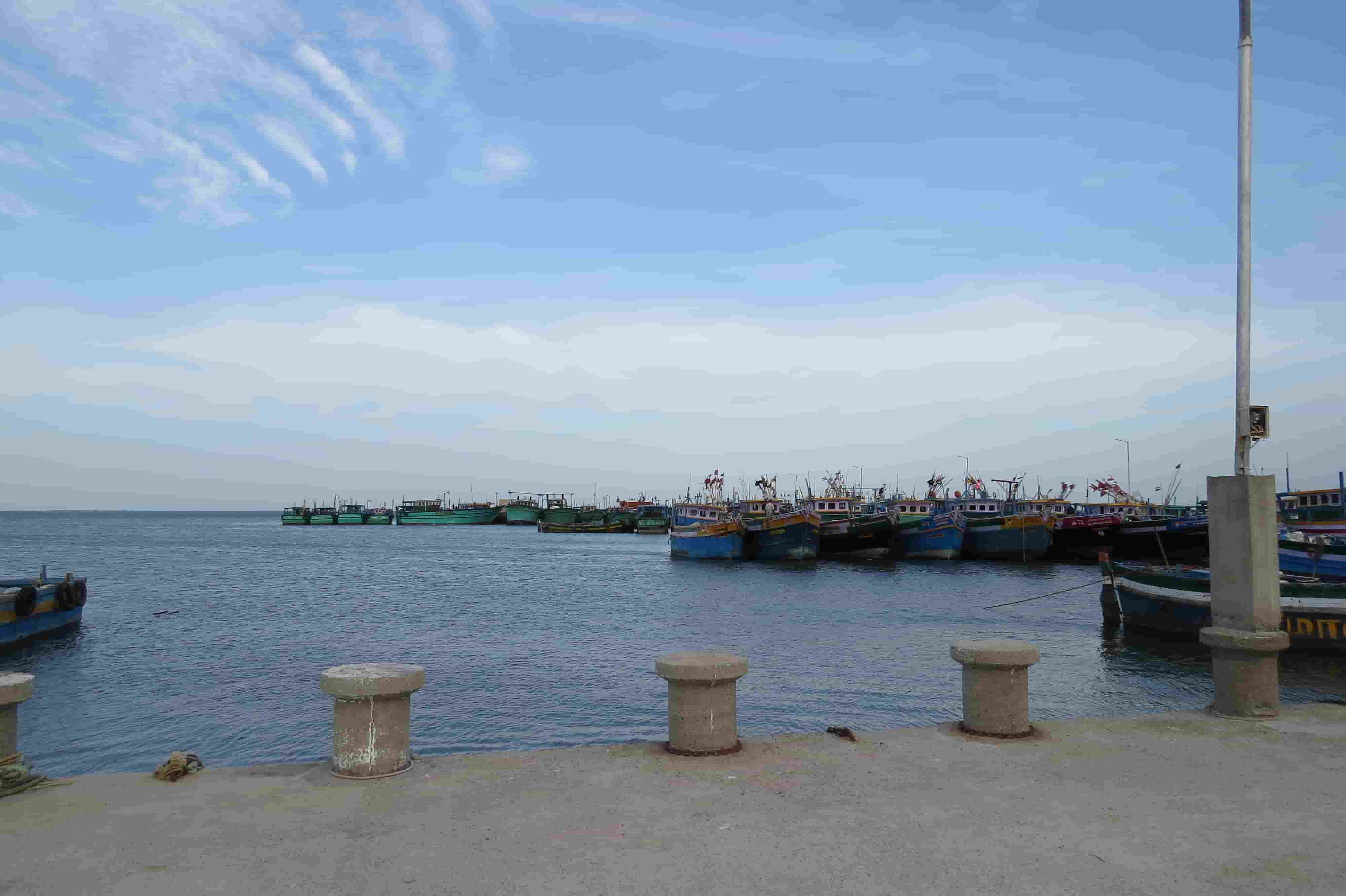 boats docked at a pier